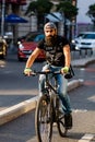 Riding a bike. Commuters on bike in Bucharest, Romania, 2021