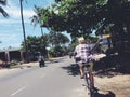 Riding a bike in Muine in South Vietnam