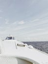 Riding a boat against blue sky