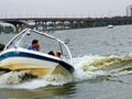 Riding a boat on the river, in the passable weather. Royalty Free Stock Photo