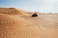 Al awir desert sand dunes with wheels traces