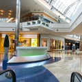 Riding down an escalator at Millenia Mall in Orlando, Florida Royalty Free Stock Photo