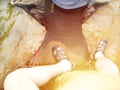 Riding elephant in water selfie top view