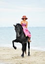 Riding girl on beach