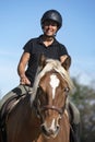 Riding girl and comtois horse