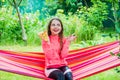 Riding in a hammock. happy childhood. child feel hunger. hungry kid going to eat italian pizza. fast food. happy Royalty Free Stock Photo