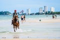 Riding horse on the beach.