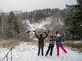 Riding on rope trolley Track in winter. People having fun together. Extreme and active lifestyle.