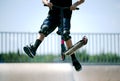 Riding a scooter doing tricks and kickflip Royalty Free Stock Photo