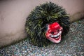 Carnival mask posing on the floor before the carnival