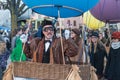 Portrait of people parading in the street with balloon