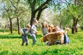 Riendly, cheerful family having a picnic.