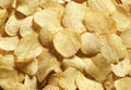 Riffle golden chips with texture potato background