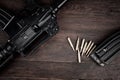Rifle and Ammunition with magazine on wooden table Royalty Free Stock Photo