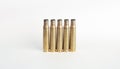 Rifle bullet shell casings on white background Royalty Free Stock Photo