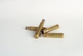 Rifle bullet shell casings on white background Royalty Free Stock Photo