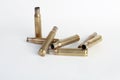 Rifle bullet shell casings on white background Royalty Free Stock Photo