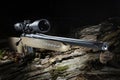 Rifle with high powered scope in the forest Royalty Free Stock Photo
