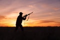 Rifle Hunter Ready at Sunset Royalty Free Stock Photo