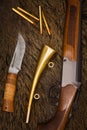 Rifle, knife and horn