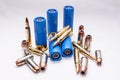 Rifled slug shotgun shells with 223 caliber bullets along with 45 caliber and 9mm hollow point bullets Royalty Free Stock Photo