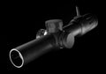 Riflescope at an angle on black