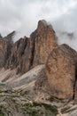 Rifugio Antermoia hut with rock towers above in the Dolomites