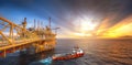 Rig platform and Supply vessel in the gulf Royalty Free Stock Photo