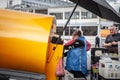 RIGA, LATIVA - AUGUST 25, 2023: Kvas seller in the streets of riga, selling kvass from a tank to clients. Kvas is a fermented Royalty Free Stock Photo