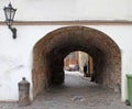 Arch passageway in old city of Riga, Latvia Royalty Free Stock Photo