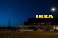 RIGA, LATVIA - APRIL 3, 2019: IKEA brand sign during dark evening and wind - Blue sky in the background