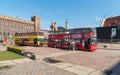 Riflemen Square with Monument to Latvian Red Riflemen and city tour bus in the historic center of Riga, Latvia Royalty Free Stock Photo