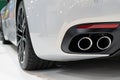 supercar Maserati Granturismo exhaust muffler, rear view, closeup