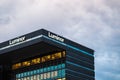 Riga/Latvia - August 2, 2020: Luminor bank building and Luminor logo at evening. Defocused Royalty Free Stock Photo