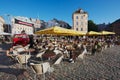 Tourists have lunch at a street cafe at the square in downtown Riga, Latvia