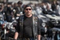 24-04-2019 Riga, Latvia. Biker portrait of biker man in black leather jacket