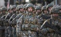 14-08-2018 Riga, Latvia Camouflaged soldier marching in formation Royalty Free Stock Photo