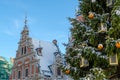 Riga / Latvia - 01 December 2019: City Hall Square with House of the Blackheads and Christmas tree in Riga Old Town Royalty Free Stock Photo