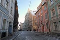 Riga / Latvia - 01 December 2019: Narrow medieval street in old town in Riga, Latvia Royalty Free Stock Photo