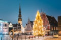 Riga, Latvia. Town Hall Square, Popular Place With Famous Landmarks On It In Bright Evening Illumination In Winter