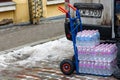 Delivery cart, full with plastic bottles