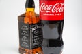 Riga, Latvia February 12.2022:Photo of Coca-Cola plastic bottle and Jack Daniel whiskey Isolated on white Background With clipping Royalty Free Stock Photo