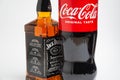 Riga, Latvia February 12.2022:Photo of Coca-Cola plastic bottle and Jack Daniel whiskey Isolated on white Background With clipping Royalty Free Stock Photo