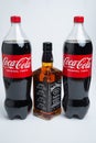 Riga, Latvia February 12.2022:Photo of Coca-Cola plastic bottle and Jack Daniel whiskey Isolated on white Background With clipping Royalty Free Stock Photo