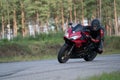 19.09.2020 Riga Latvia Handsome motorcyclist in black riding his super sport motorcycle