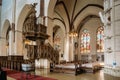 Riga, Latvia. Interior Of The Riga Dom Dome Cathedral Church. Decorative Elements, Statues On The Pulpit