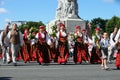 RIGA, LATVIA - JULY 06: People in national costumes at the Latvian National Song and Dance Festival on July 06, 2013. Holiday was