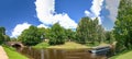 RIGA, LATVIA - JULY 7TH, 2017: Panoramic view of Riga Pilsetas Canals and boat tour on a sunny day Royalty Free Stock Photo