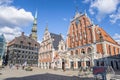 Riga, Latvia- July 7, 2023: Town Hall Square, house of the Blackheads, sculpture of Saint Roland and Saint Peters Church in old