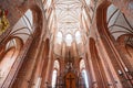 Riga Latvia. Vaulted Ceiling Of St. Peter`s Lutheran Church In Sunlight. Interior Of Famous Landmark